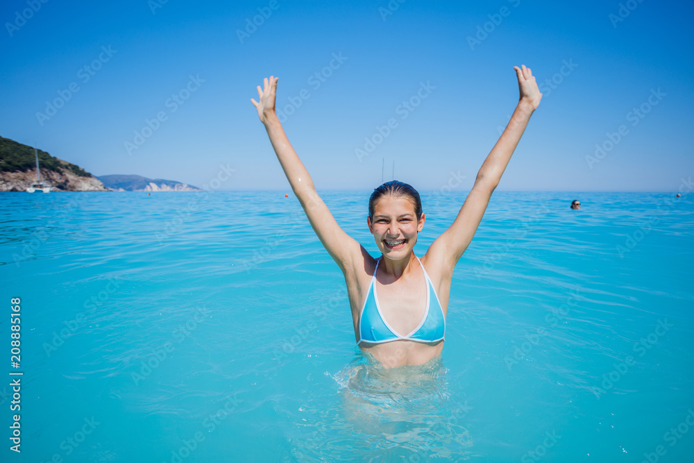 Happy young girl enjoy beach vacation Happy young girl enjoy beach vacation