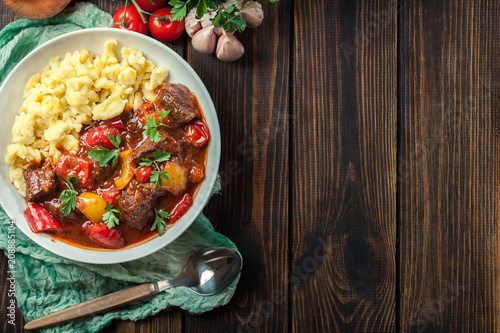 Hungarian beef goulash serwed with galuska noodles