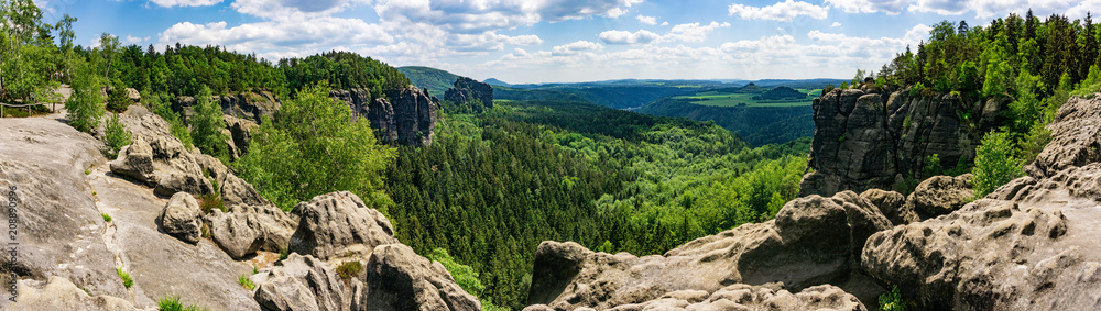 Saxon Switzerland in Germany, as seen from Breite Kluft vantage Point. The Elbe Sandstone Mountains are a famous hiking region in Germany. 