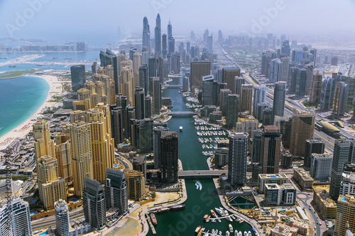Photography Aerial view of modern skyscrapers and sea in the background, Dubai, UAE