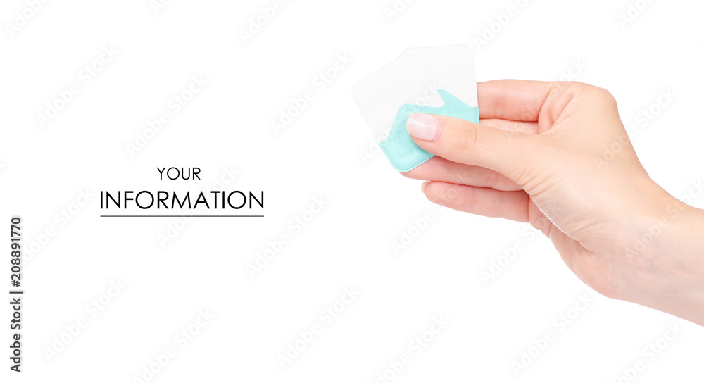 Film for a tooth X-ray in a hand pattern on a white background isolation Film for a tooth X-ray in a hand pattern on a white background isolation