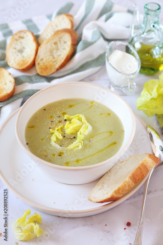 French cuisine: potage Choisy. Lettuce cream soup with rice