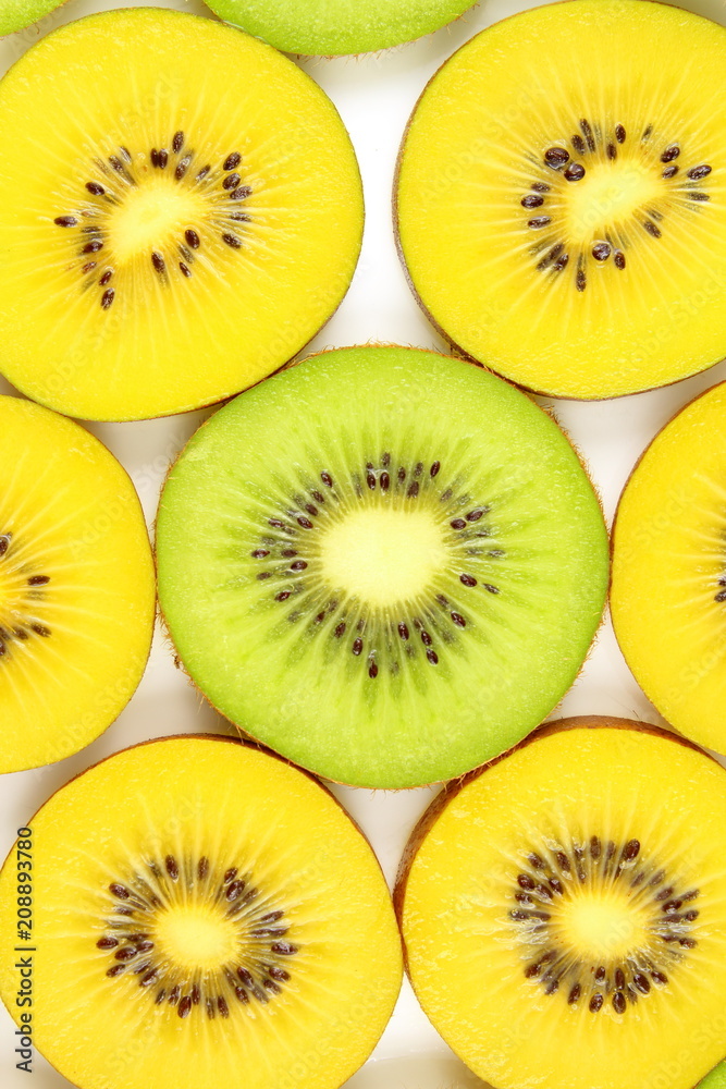 slices of fresh green and yellow kiwi fruits food background texture slices of fresh green and yellow kiwi fruits food background texture