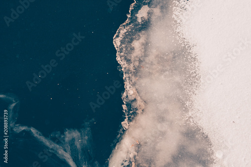Fotografi Rear background ice-bound river, winter snow frosty weather