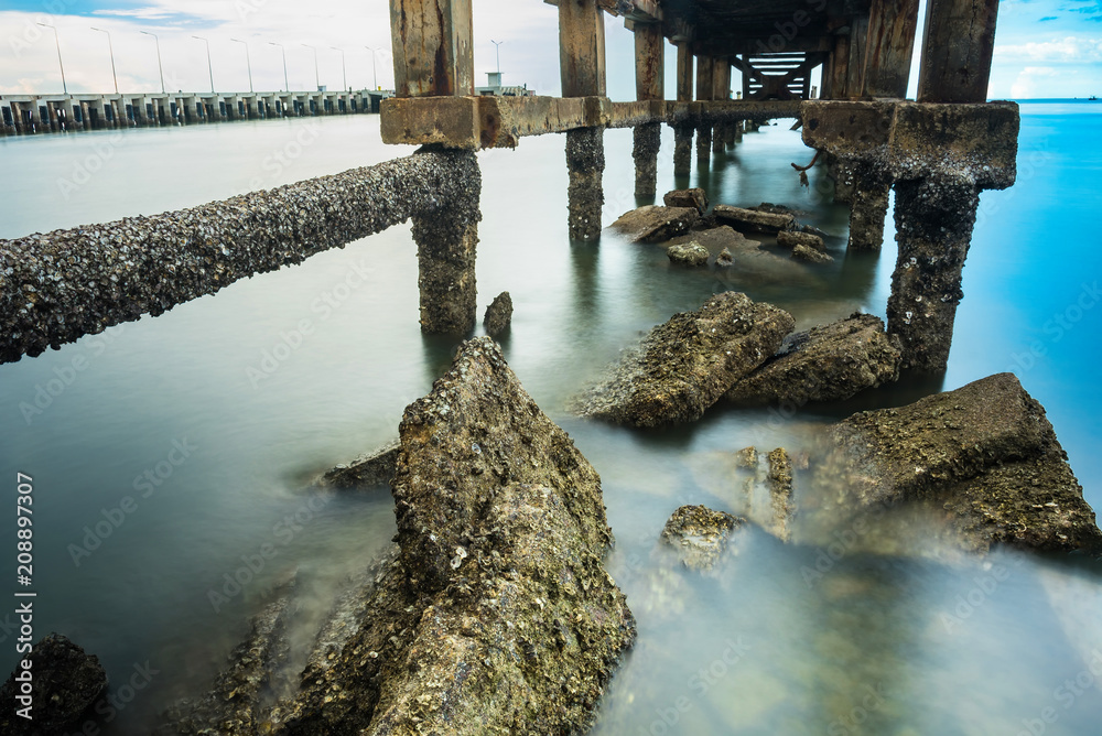 Under The ruins of Jetty, Photo long exposure, Seascape of thailand. Under The ruins of Jetty, Photo long exposure, Seascape of thailand.