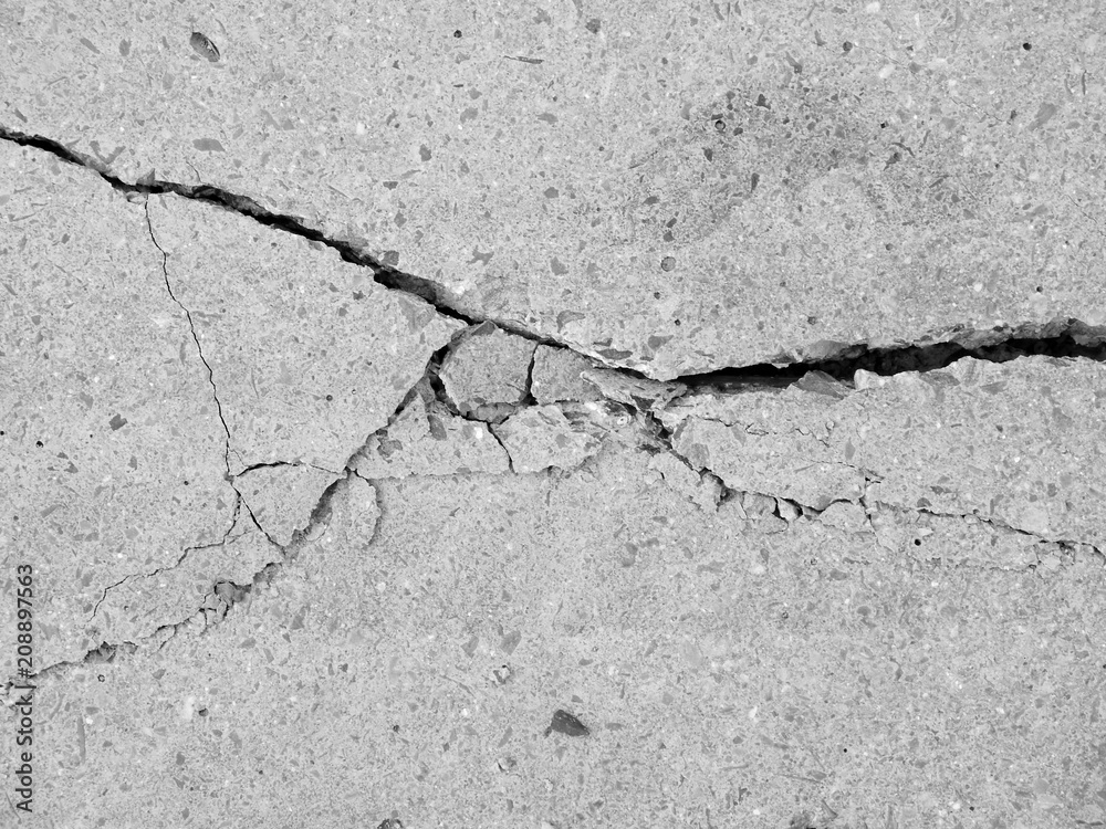 Obraz premium Cracked concrete texture closeup background