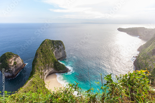 This is Kelingking Beach on the island of Nusa Penida near the island of Bali in Indonesia