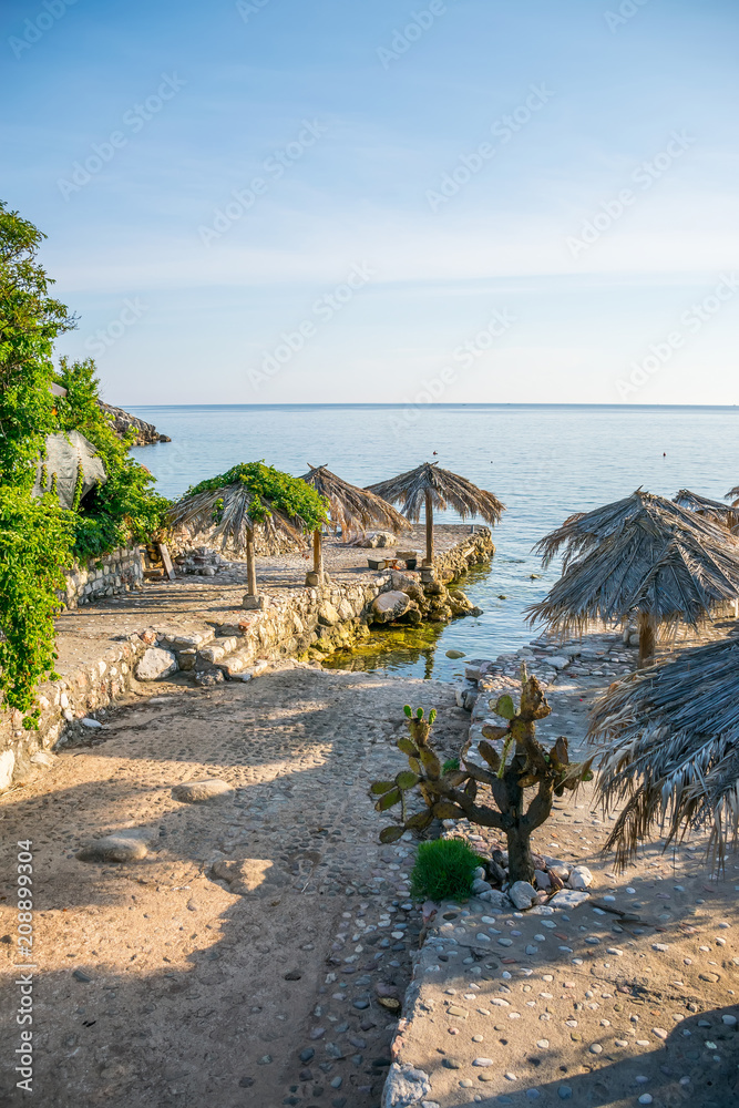 A secluded picturesque lagoon in the rays of the sunset.