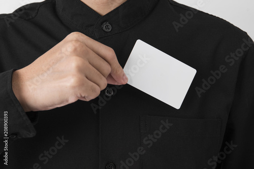 employee catch blank business card in pocket for mockup template logo branding background.