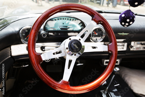 ISRAEL, PETAH TIQWA - MAY 14, 2016:  Exhibition of technical antiques. Steering wheel and dashboard in interior of  automobile in Petah Tiqwa, Israel © Victoria Key