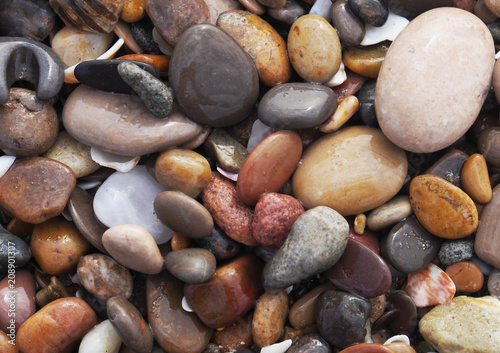Fine gravel, natural stones.Pebble stones by the sea.