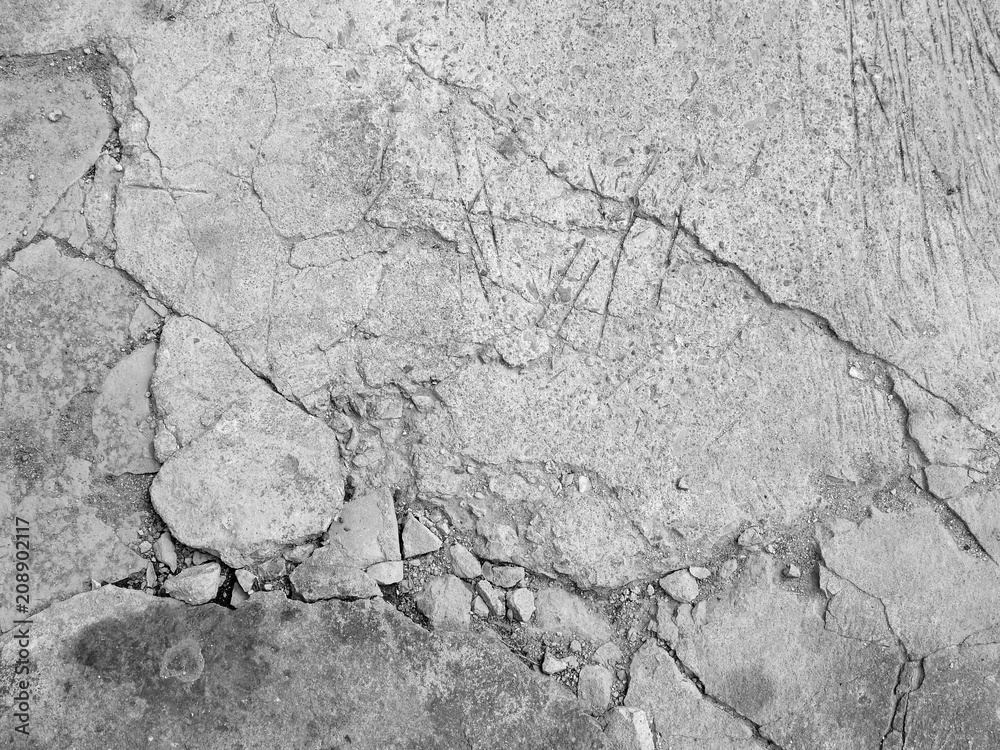 Cracked concrete texture closeup background