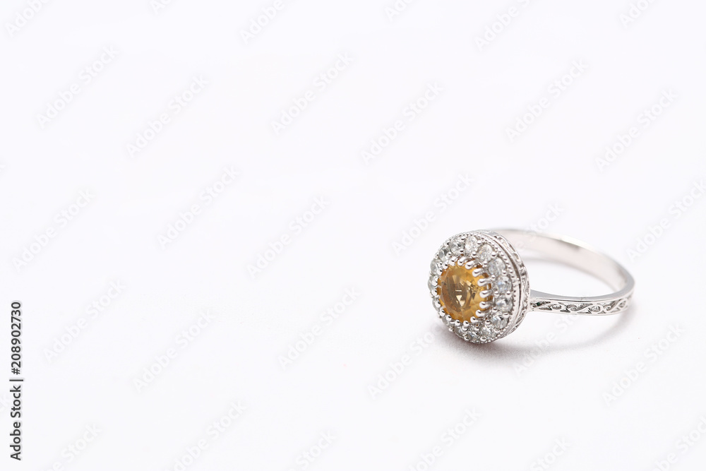 Yellow gem stone and diamond ring Yellow gem stone and diamond ring