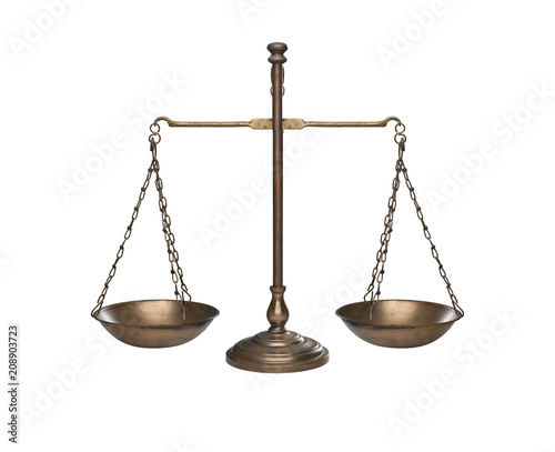 vintage golden balance or scale isolated against white background