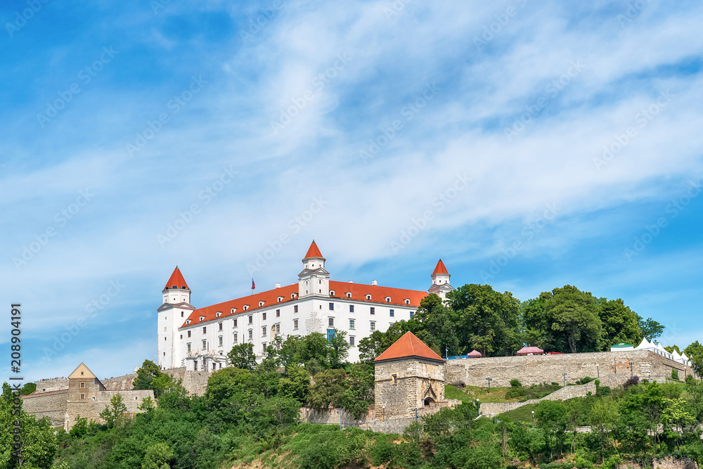 Bratislava, Slovakia - May 24, 2018: View of Bratislava castle which occupies a prominent location in the city overlooking the Danube river. 