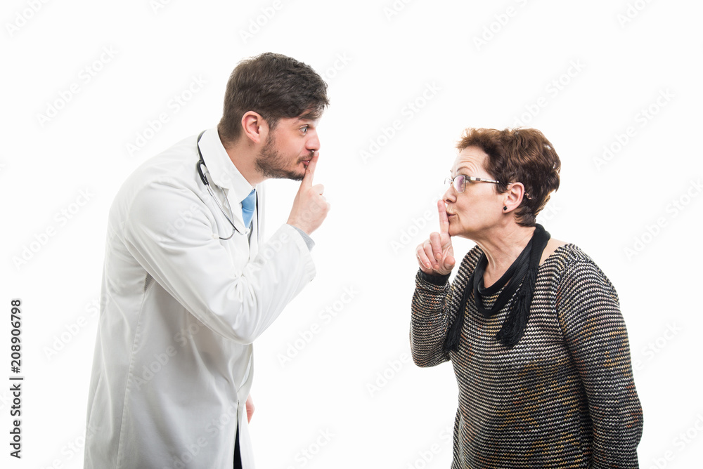 Male doctor and female senior patient both showing silent Male doctor and female senior patient both showing silent