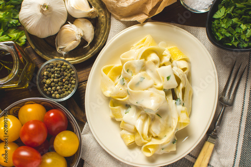Alfredo Pasta Plate with Creamy Cheese and Basil Sauce