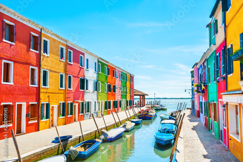 Scenic canal with colorful buildings in Burano island, Venice, Italy © smallredgirl