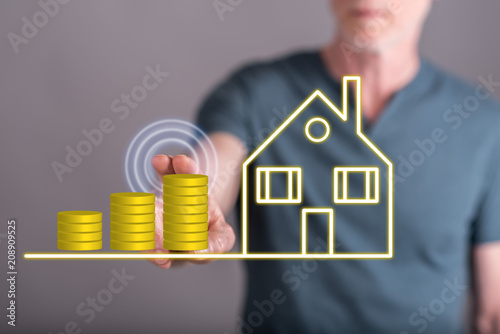Man touching a real estate investment concept