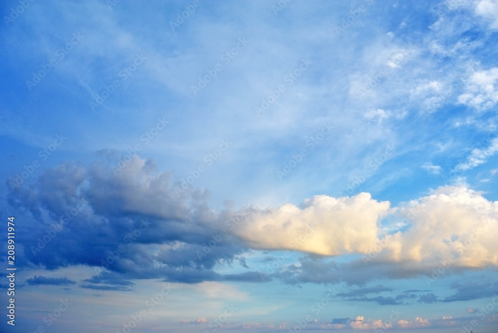 Blue sky with white cumulus clouds background