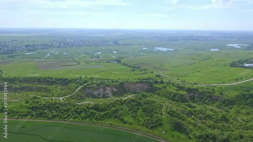 Aerial view of the quarry. Sand hills of abandoned quarry. Green nature. Summer. Ternopil Ukraine Aerial view of the quarry. Sand hills of abandoned quarry. Green nature. Summer. Ternopil Ukraine