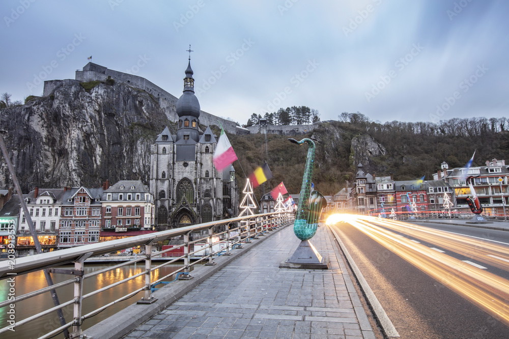 Obraz premium Dinant cityscape, Belgium. Collegiate Church of Our Lady near Meuse river.