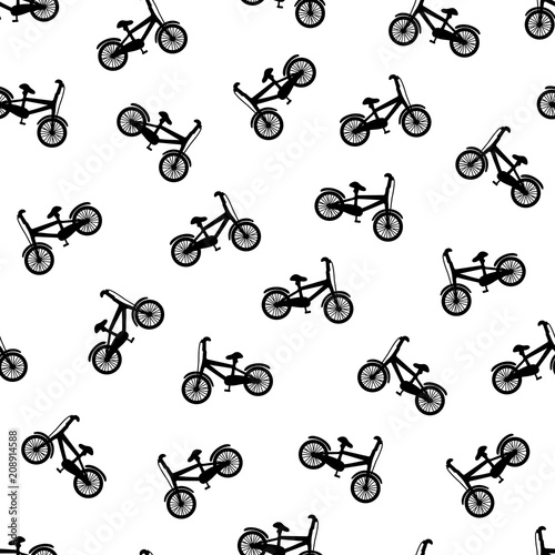 Seamless pattern with black bicycles on the white background.