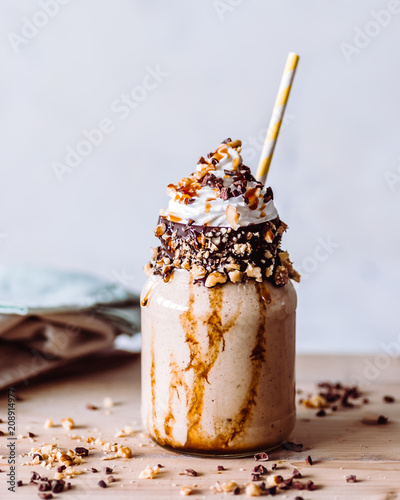 Chocolate oatmeal and banana milkshake smoothie photo