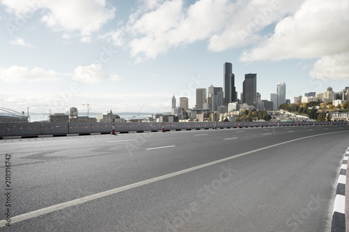 empty road with city skyline