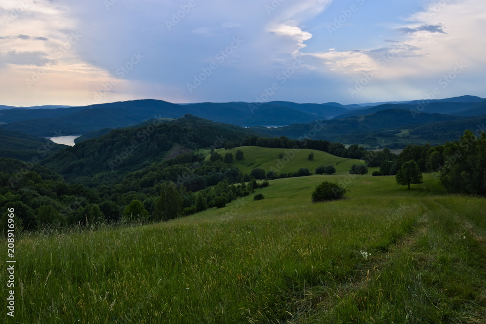 Mountain view over the Carpathian hills in the Poloniny national park in Slovakia with a view on the Starina reservoir