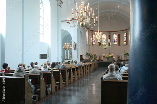 Interior and visitors of the The Saint Gertrudis church photo