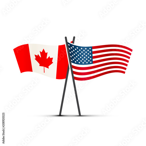USA and Canada flags on poles on white
