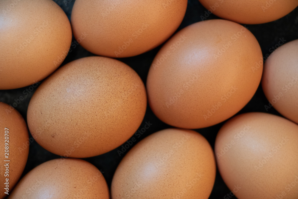 Many eggs resting on counter top full frame Many eggs resting on counter top full frame