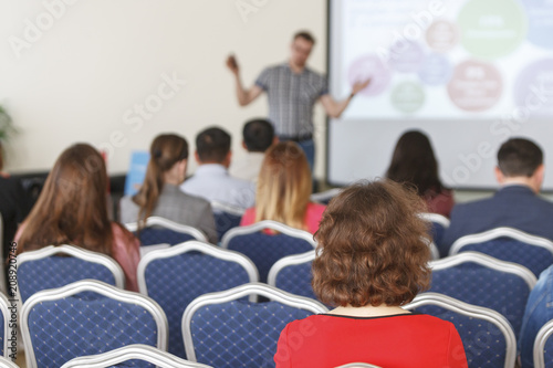 Speaker at a business conference and presentation. 