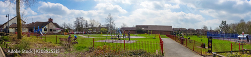 A panoramic view of a village playground.