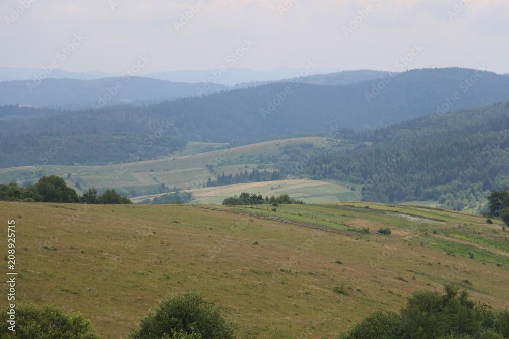Carpathian landscapes . Carpathian Mountains, mountain haze, blurred background.