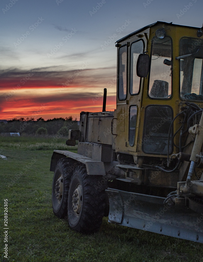 tractor and sunset