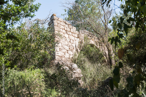 Ruins  of abandoned Palestinian village Kafr Birim in the north of Israel in which the christians Maronites lived until the middle of the 20th century photo