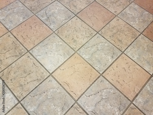 brown and grey floor tiles