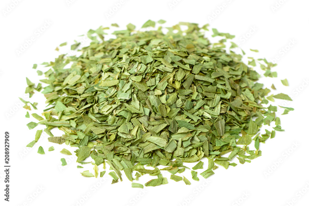 chopped tarragon leaves isolated on white chopped tarragon leaves isolated on white