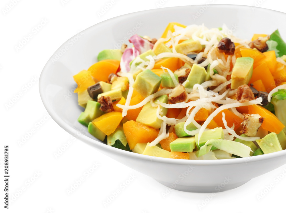 Plate of tasty salad with ripe avocado on white background, closeup