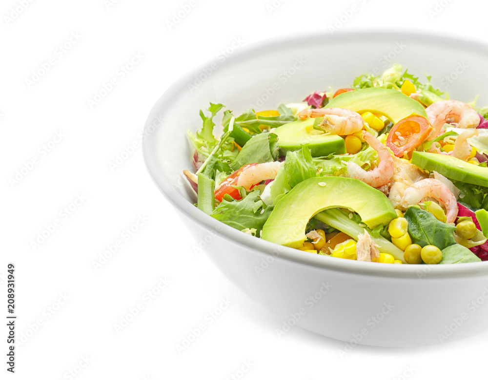 Bowl of tasty salad with ripe avocado on white background Bowl of tasty salad with ripe avocado on white background