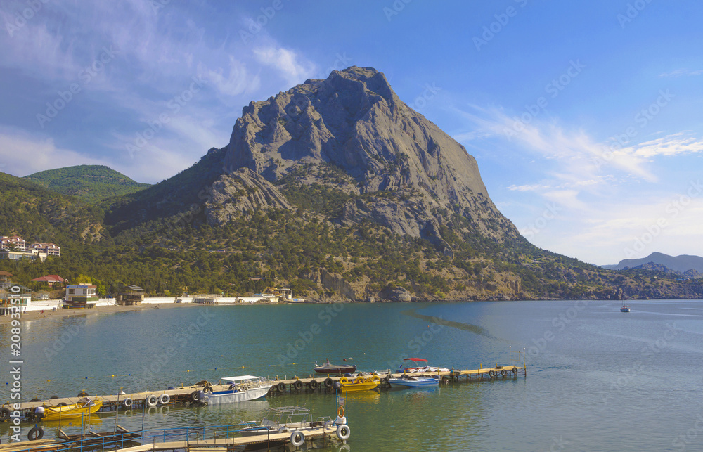 View of the mountains and the sea Bay with piers,small powerboats.Crimea.