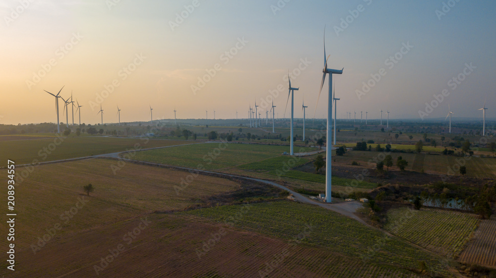 Wind turbine farm and agricultural fields. aerial shot