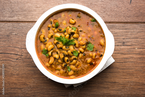 Billede på lærred Black Eyed Kidney Beans Curry or Chawli chi usal / Barbati masala, served in a c