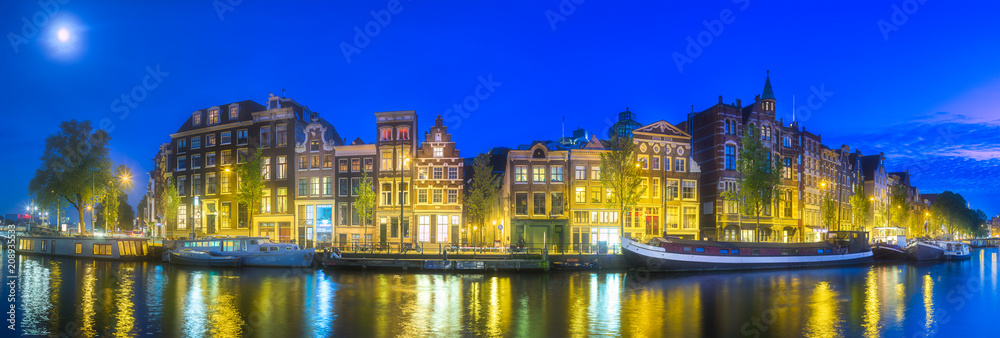 Amsterdam city skyline with moon, Netherlands