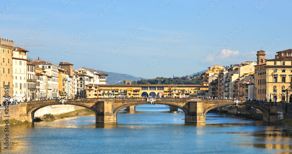 famous Ponte Vecchio old bridge in Venice on Arno River with old architecture, Italy