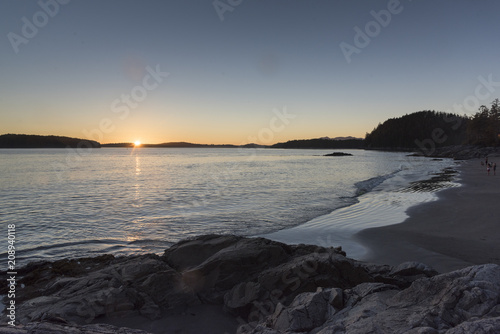 Scenic view of the beach at sunset, Tonquin Beach, Tofino, Vancouver Island, British Columbia, Canada © klevit