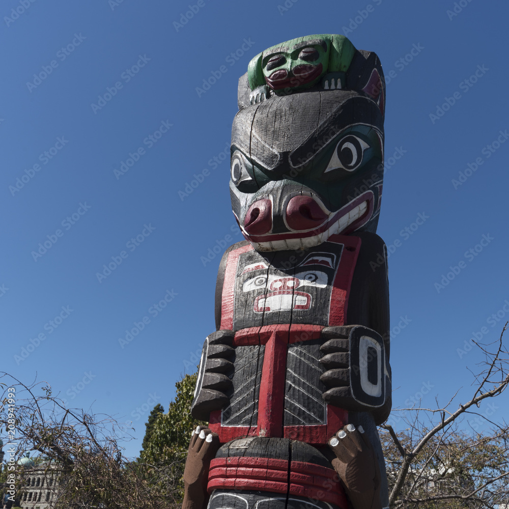 Low angle view of a totem pole, Victoria, Vancouver Island, British Columbia, Canada Low angle view of a totem pole, Victoria, Vancouver Island, British Columbia, Canada