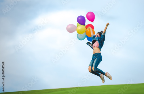 Asian women have fun and enjoy with balloon.